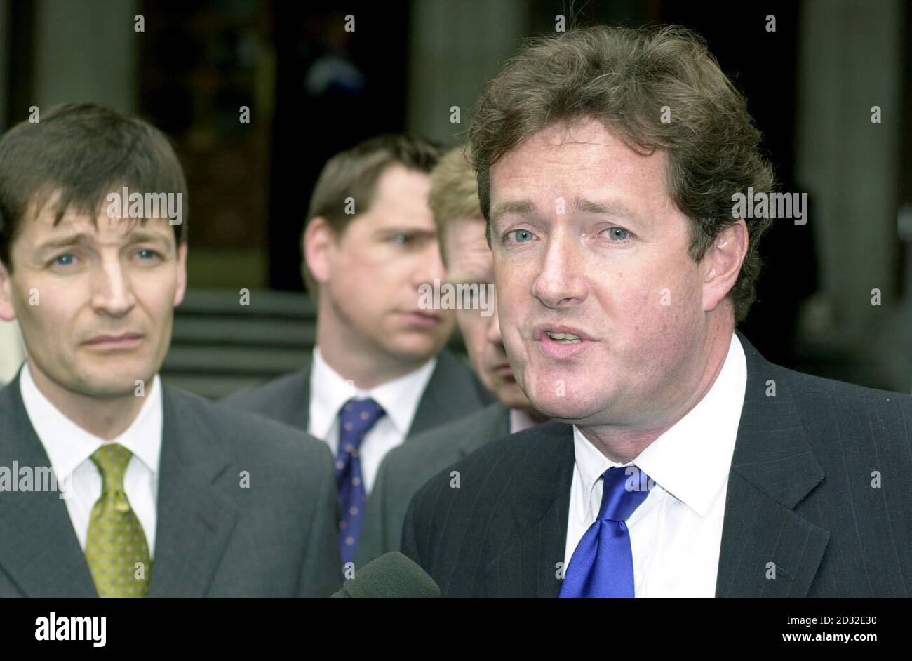 Piers Morgan (right), editor of The Mirror, leaves the High Court in London after supermodel Naomi Campbell won  3,500 damages from the newspaper following a ruling that it acted in breach of confidence in publishing details of her therapy at Narcotics Anonymous. Stock Photo