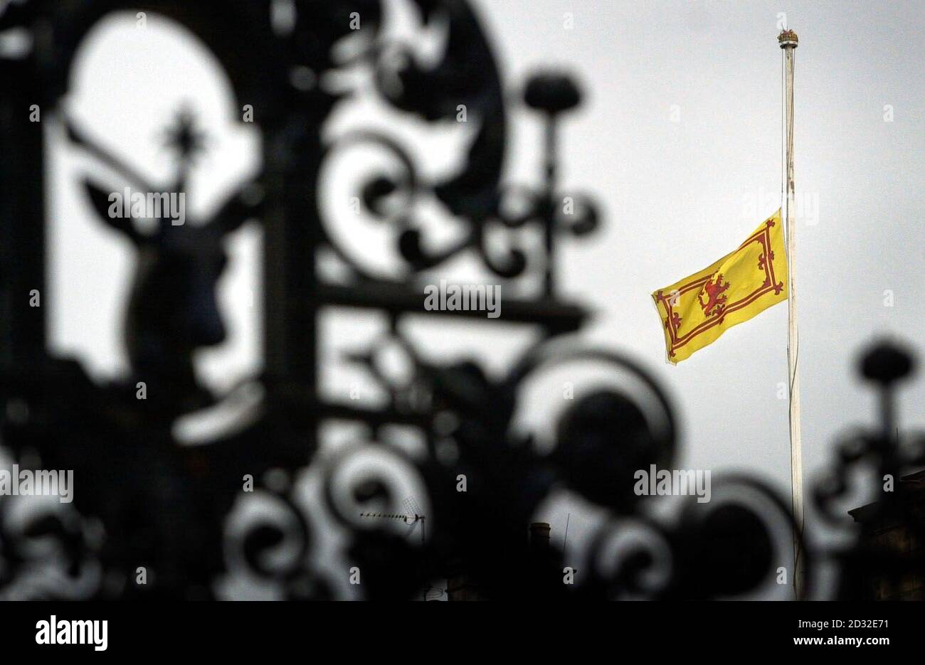 The Lion rampant flag flies at halfmast over the Palace of