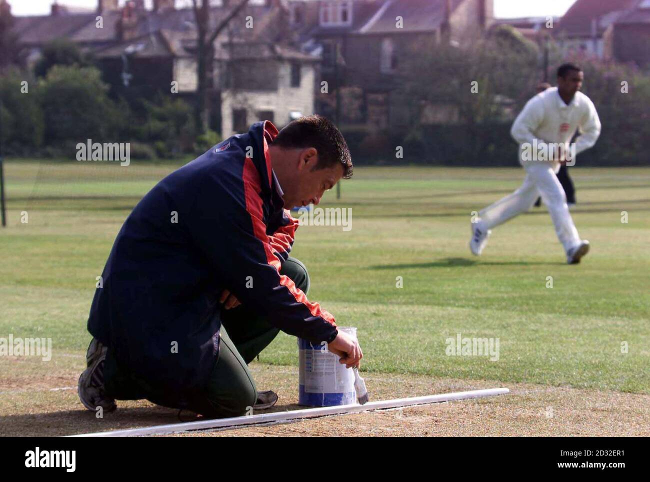 The John Moden Head Groundsman prepares the pitch at Fenners cricket ground, Cambridge, the home of Cambridge University cricket Club ahead of the start of the season which begins Cambridge UCCE will be playing Middlesex . Stock Photo