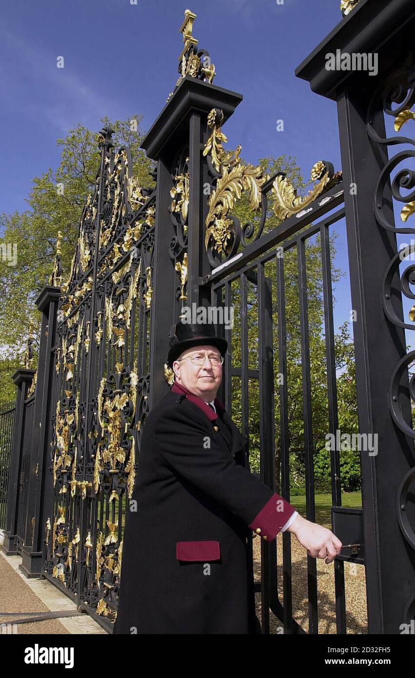 Ralph Pottinger, from South Shields, Newcastle, the operations supervisor for the State Apartments at Kensington Palace, in London, opens the Gold Gates that will be the new public entrance for the State Apartments and the Royal Ceremonial Dress Collection.   *...The new entrance will enable visitors to see the Rose Garden which was previously hidden from view.  The gates are French and built around 1879, based loosely on a Louis XV style and were moved to their current position in 1989.   Stock Photo