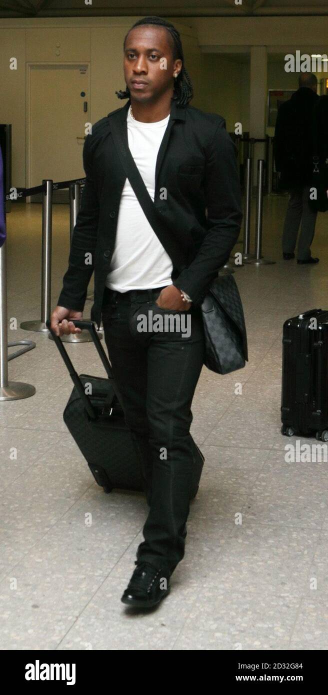 Arouca arrives at Heathrow as the Brazilian team leave the UK from Heathrow Airport. Stock Photo