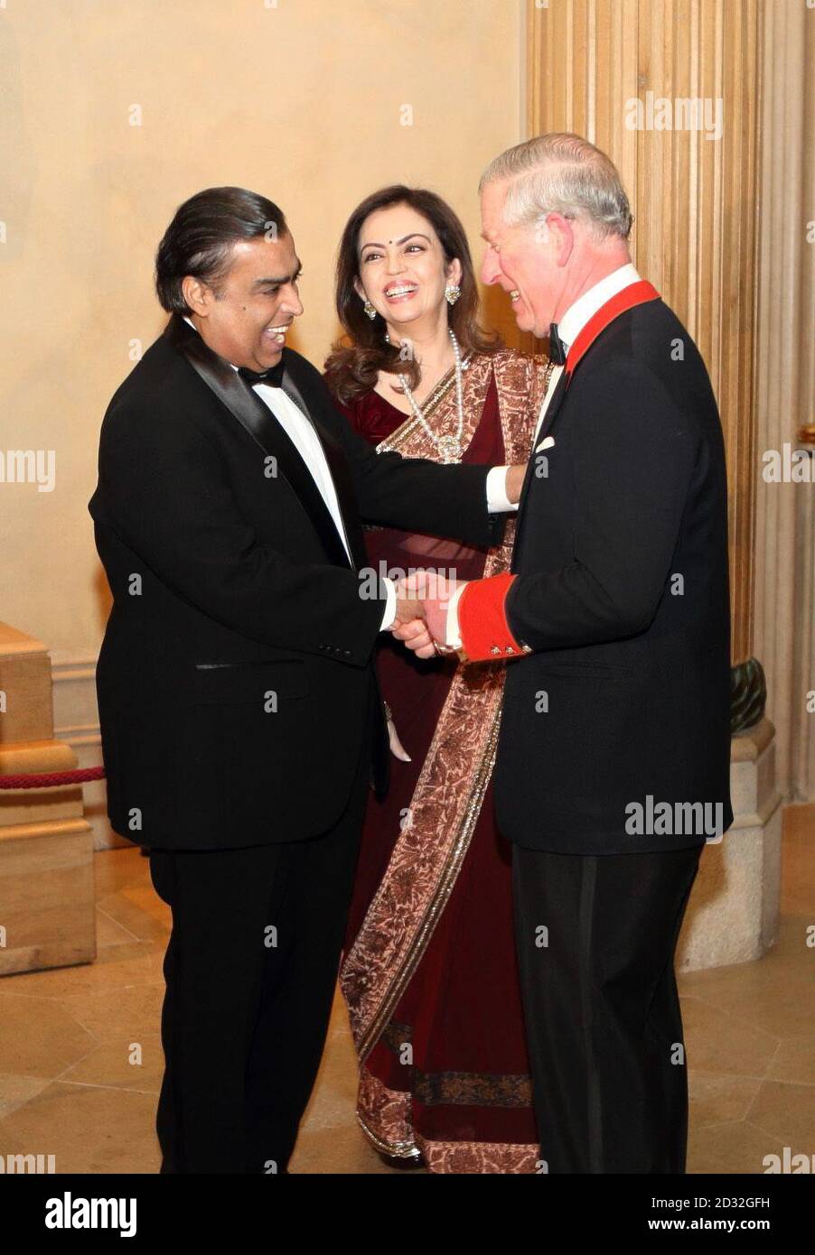 The Prince of Wales meets Smukesh Ambani as he holds a reception and dinner for the British Asian Trust at Windsor Castle, Berkshire. Stock Photo
