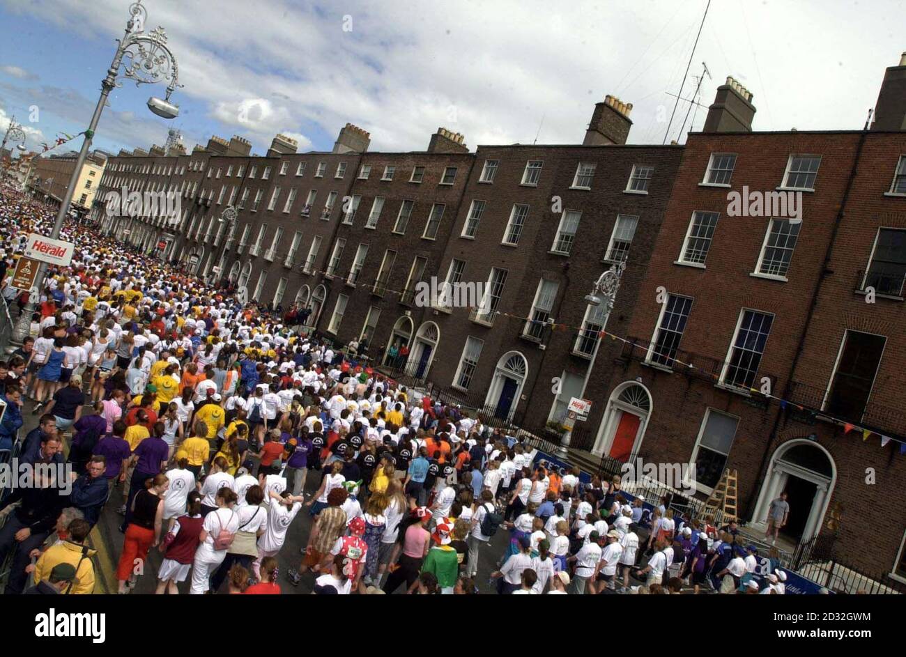 Competitors in the Tesco Ireland Mini-Marathon, at the start of the 6.2 mile race around the streets of Dublin. The race attracted approximately 40,000 competitors, many of which were raising money for charity in fancy dress.  Stock Photo