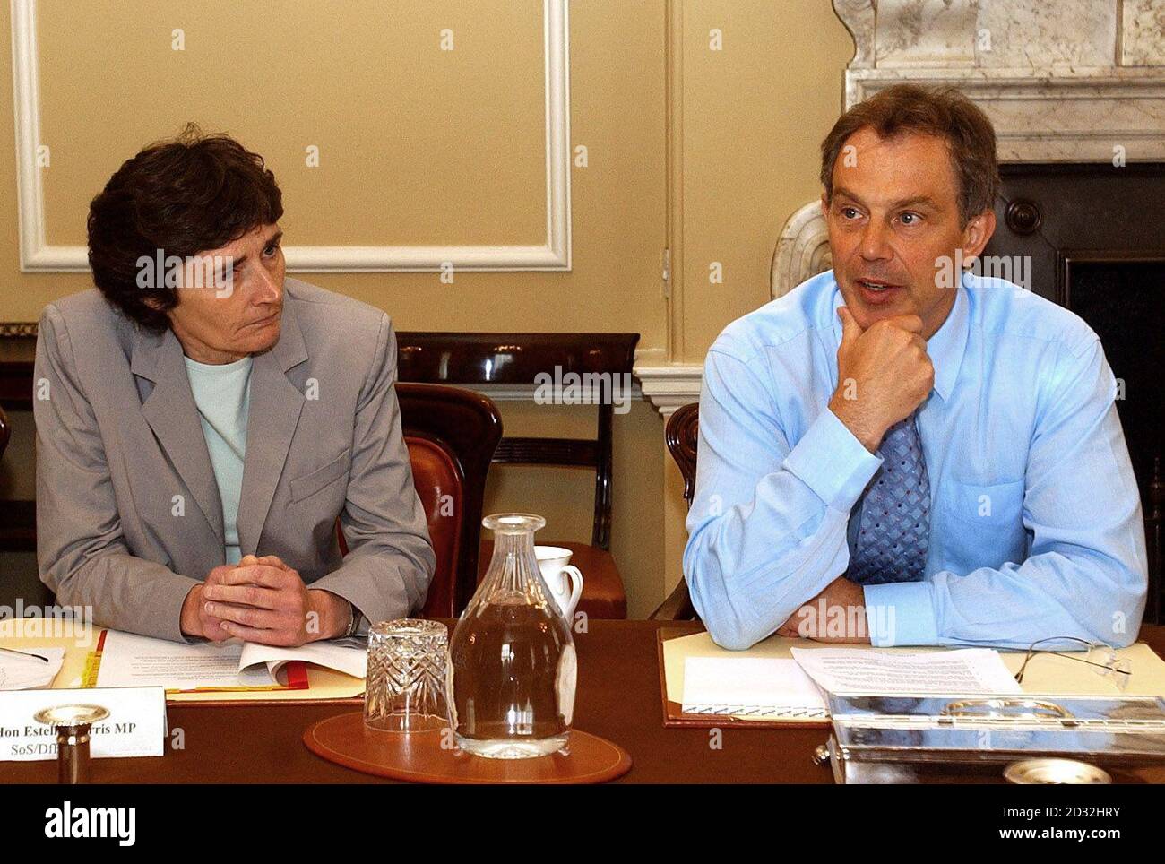 Prime Minister Tony Blair (centre) with Education Secretary, Estelle Morris (left) during a meeting with education heads, in the cabinet room at 10 Downing Street, London.   *The Prime Minister told the assembled heads and town hall education officials that there were some serious problems we have known about for a period of time concerning pupil behaviour and school discipline.   Stock Photo