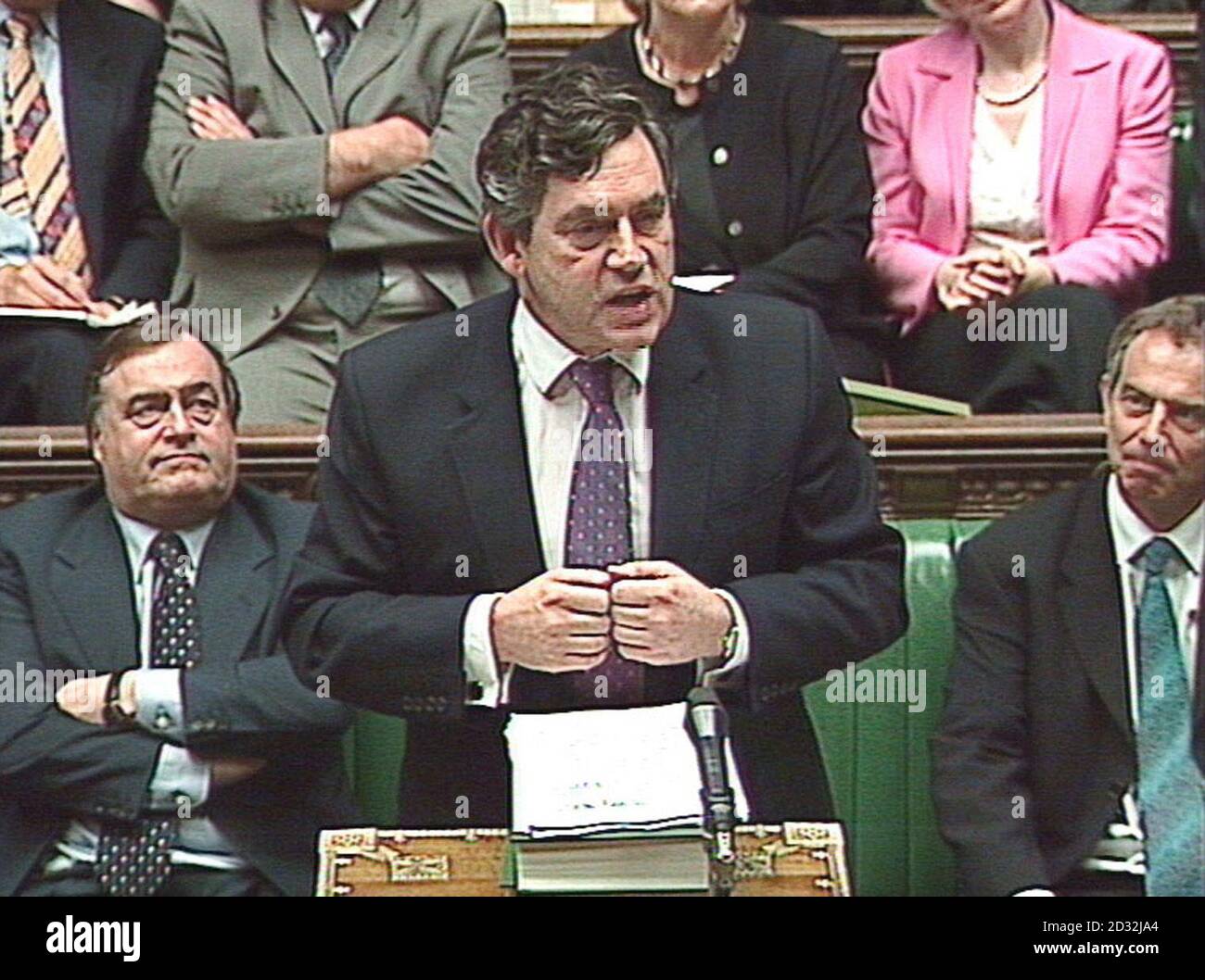 Prime Minister Tony Blair (right) and deputy Prime Minister John Prescott (left) listen to British Chancellor of the Exchequer Gordon Brown in the House of Commons in London, where he outlined his Comprehensive Spending Review.   * Education will get the main share of his  90 million package, with the Home Office, Defence, Overseas Aid and Transport all sharing in the spending boost. Stock Photo