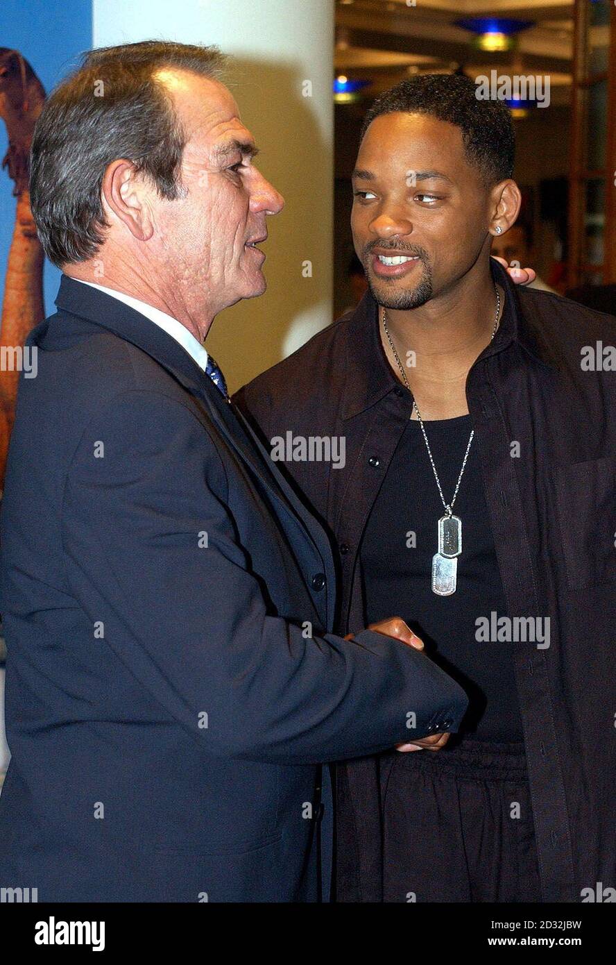 Actors Tommy Lee Jones (L) and Will Smith during a photocall at the BAFTA offices in London's Piccadilly, to promote his new film 'Men In Black 2'.  Stock Photo