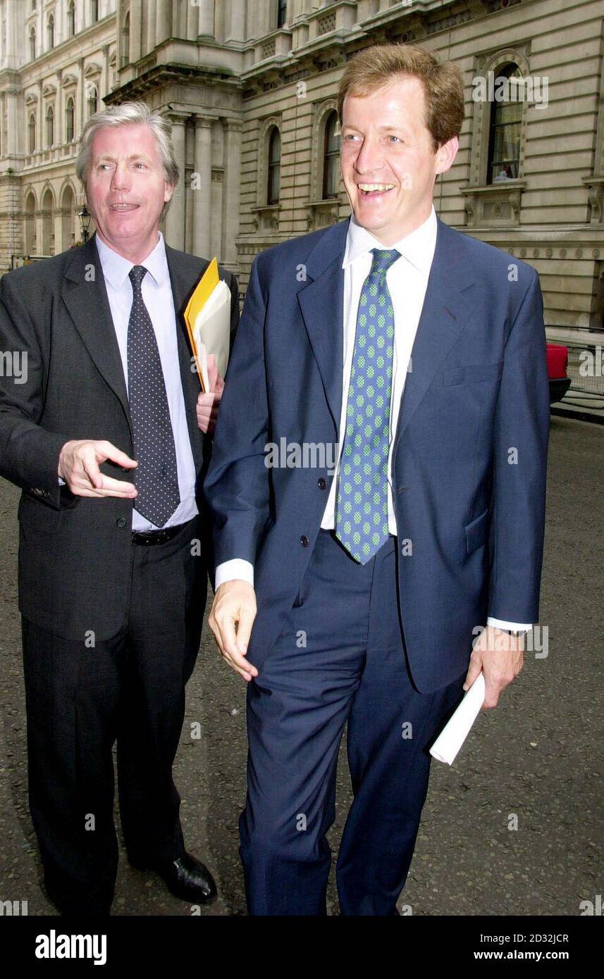 Alastair Campbell (right), the Director of Communications and Strategy for Prime Minister Tony Blair, laughs with MP for West Devon and Torridge John Burnett outside No 10 Downing Street in central London.    *Mr Burnett arrived with other local MP's from the Devon area as well as local head teachers and governors as they gave in a petition to No 10 demanding to 'Stop Depriving Devon's Schools'. Stock Photo