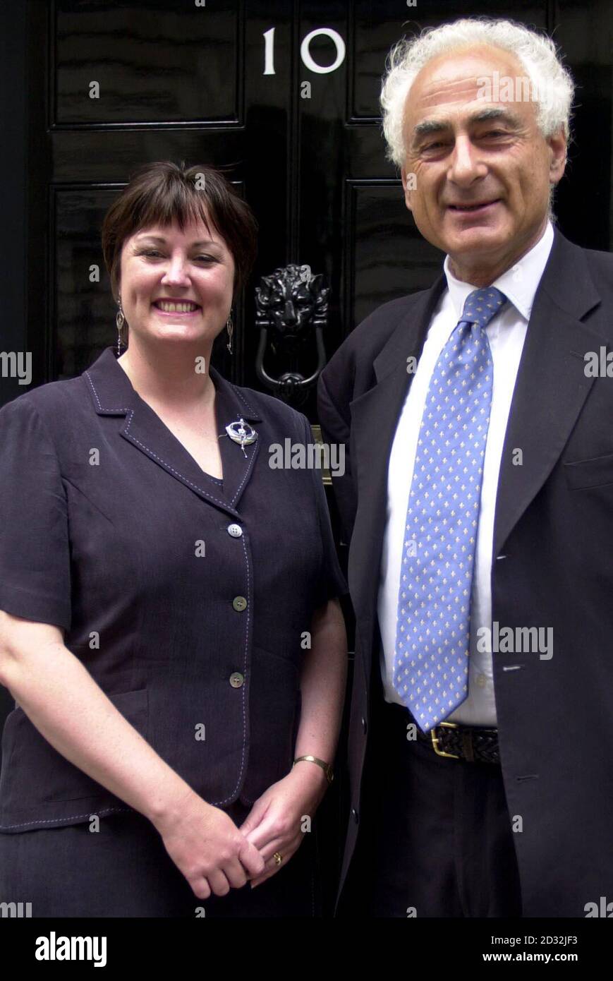 MP for Totnes in Devon, Anthony Steen stands with a head teacher from Devon outside No 10 Downing Street in central London. Mr Steen arrived with other local MP's from the Devon area as well as local head teachers and governors,  * ... as they gave in a petition to No 10 demanding to 'Stop Depriving Devon's Schools'. Stock Photo