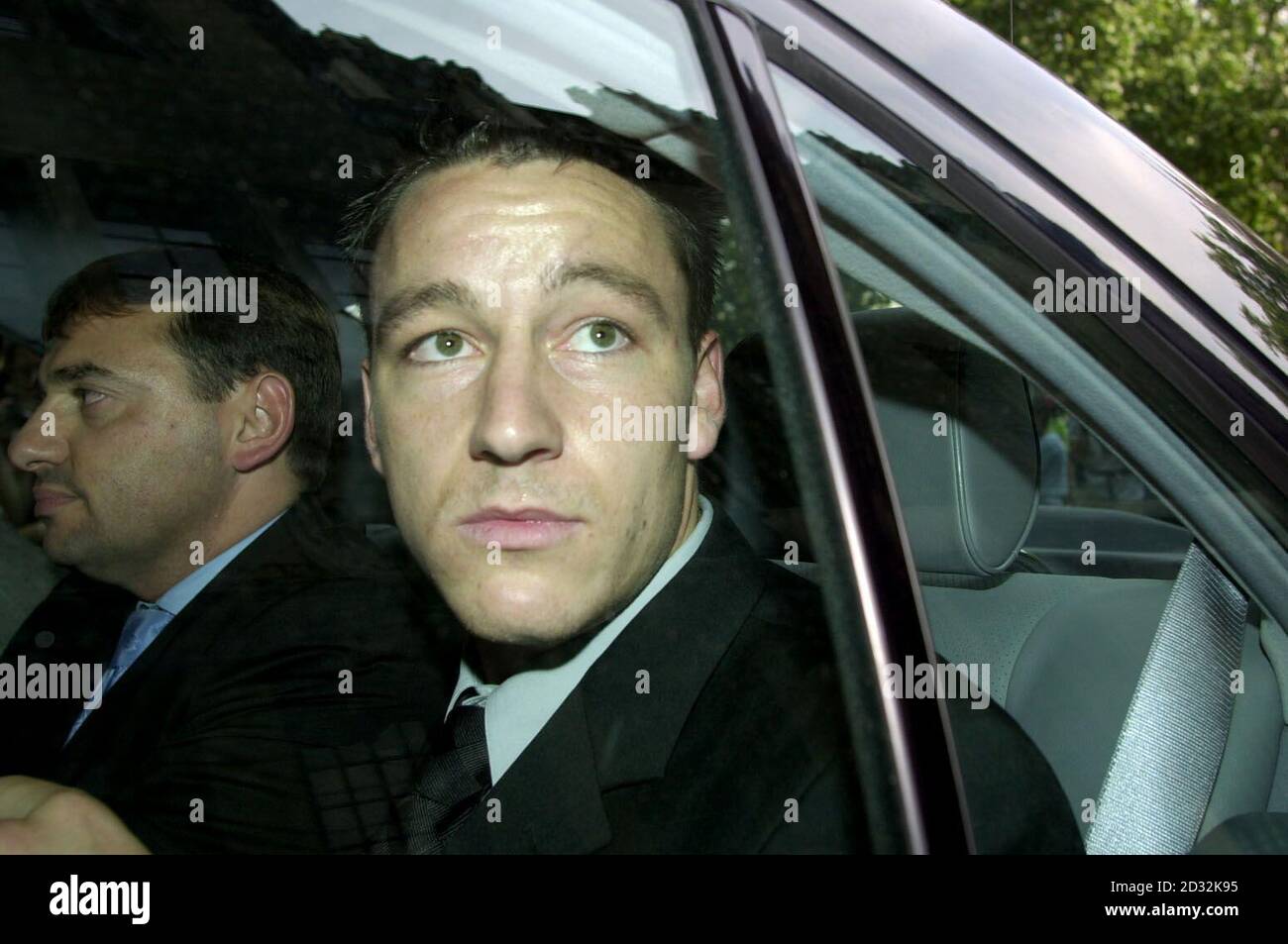Chelsea footballer John Terry (right) leaving Middlesex Guildhall Crown Court, London on the third day of the trial.    *  Chelsea footballer John Terry, 21, along with team-mate Jody Morris, 23 and Wimbledon defender Des Byrne, 21 were arrested over an alleged brawl at a fashionable night club in Knightsbridge, central London. Doorman for The Wellington Club in Knightsbridge, Trevor Thirlwall, 28, claims his left eye exploded in blood when Terry hit him with a bottle after he ejected the three footballers from the club for loutish behaviour.  Stock Photo