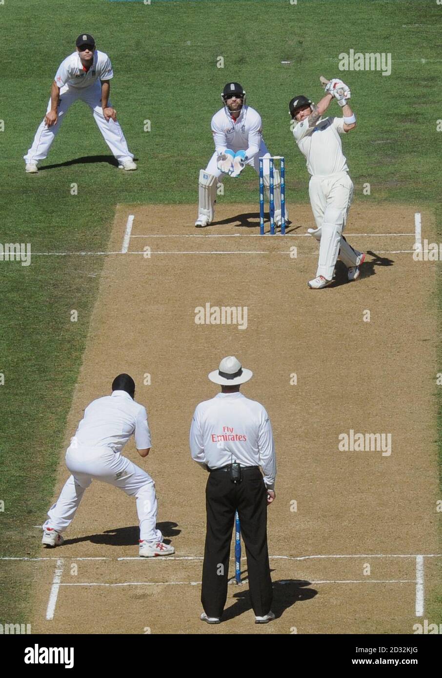 New Zealand's Brendon McCullum (top right) hits a six into the second tier  of the stands during day four of the Third Test match at Eden Park,  Auckland, New Zealand Stock Photo -