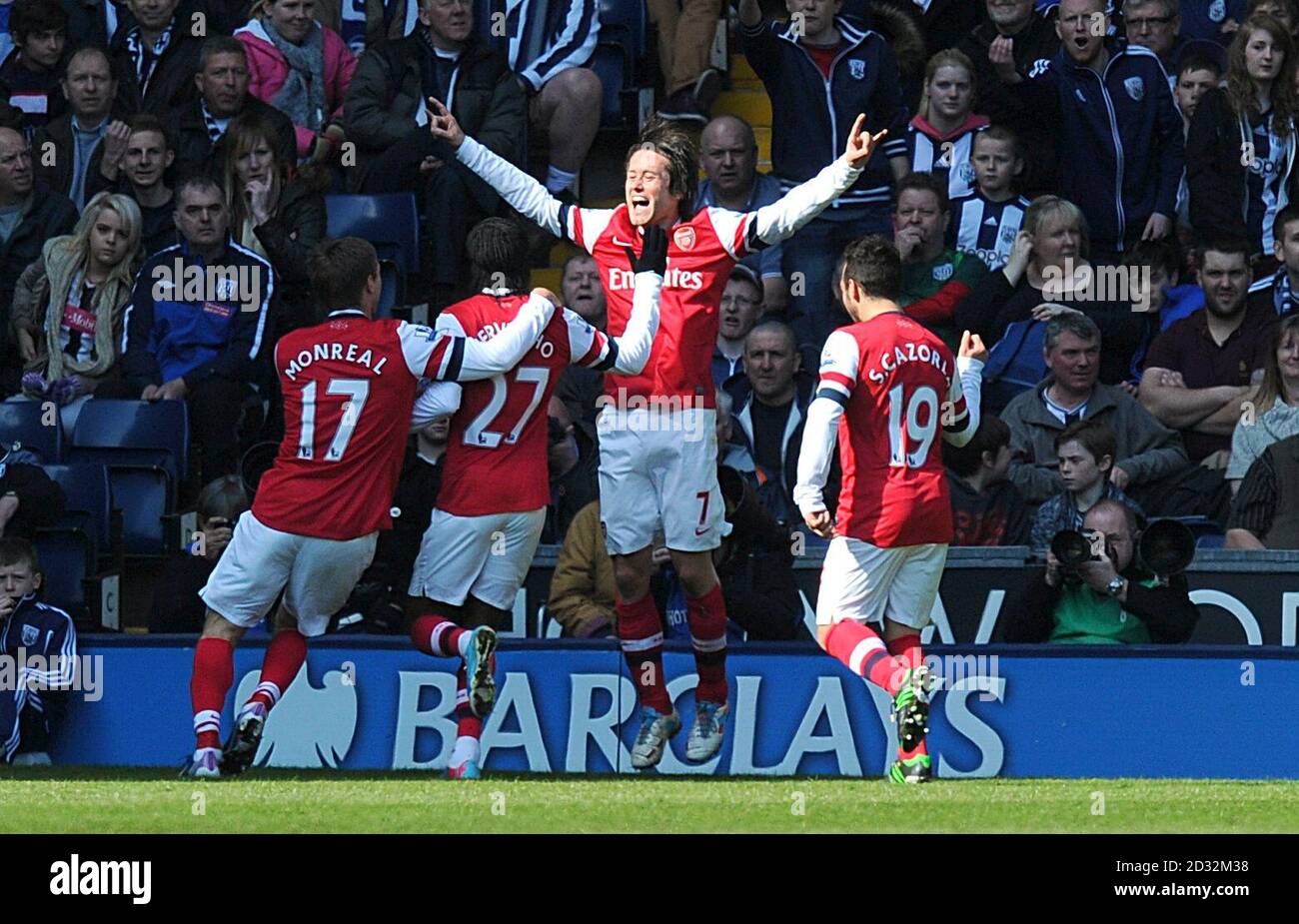 Arsenal's Tomas Rosicky (centre right) celebrates scoring their first goal of the game with team-mates Stock Photo