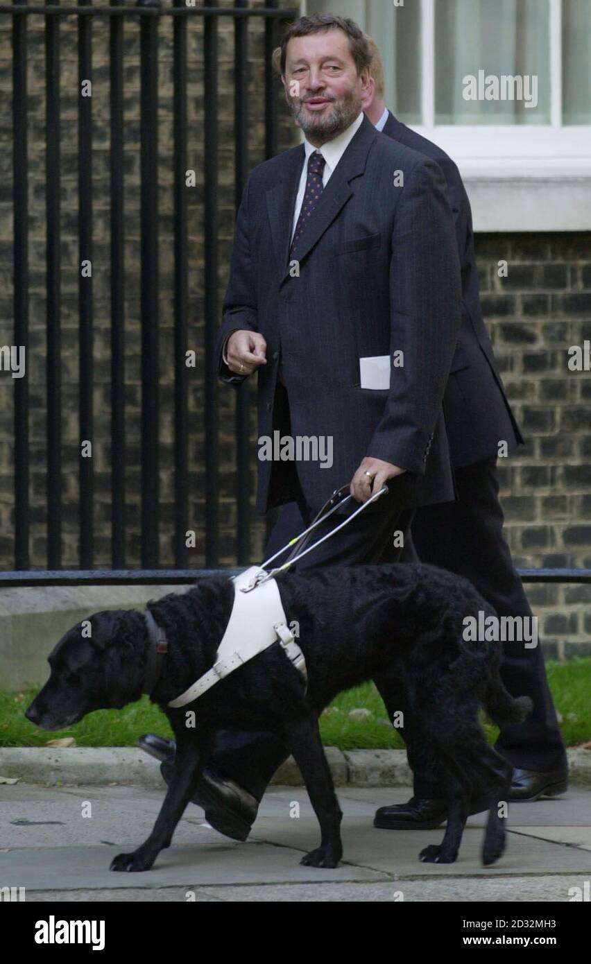 Home Secretary David Blunkett arriving for a cabinet meeting at Downing Street in London where ministers were being briefed by the Prime Minister ahead of the publication by the Government Tuesday of a dossier detailing Saddam Hussein's weapons of mass destruction .  *...and the recall of Parliament later in the day. International Development Secretary Clare Short has warned that a Gulf War-style invasion would be wrong, and pleaded for consideration to be given to the fate of innocent Iraqi civilians.  Stock Photo