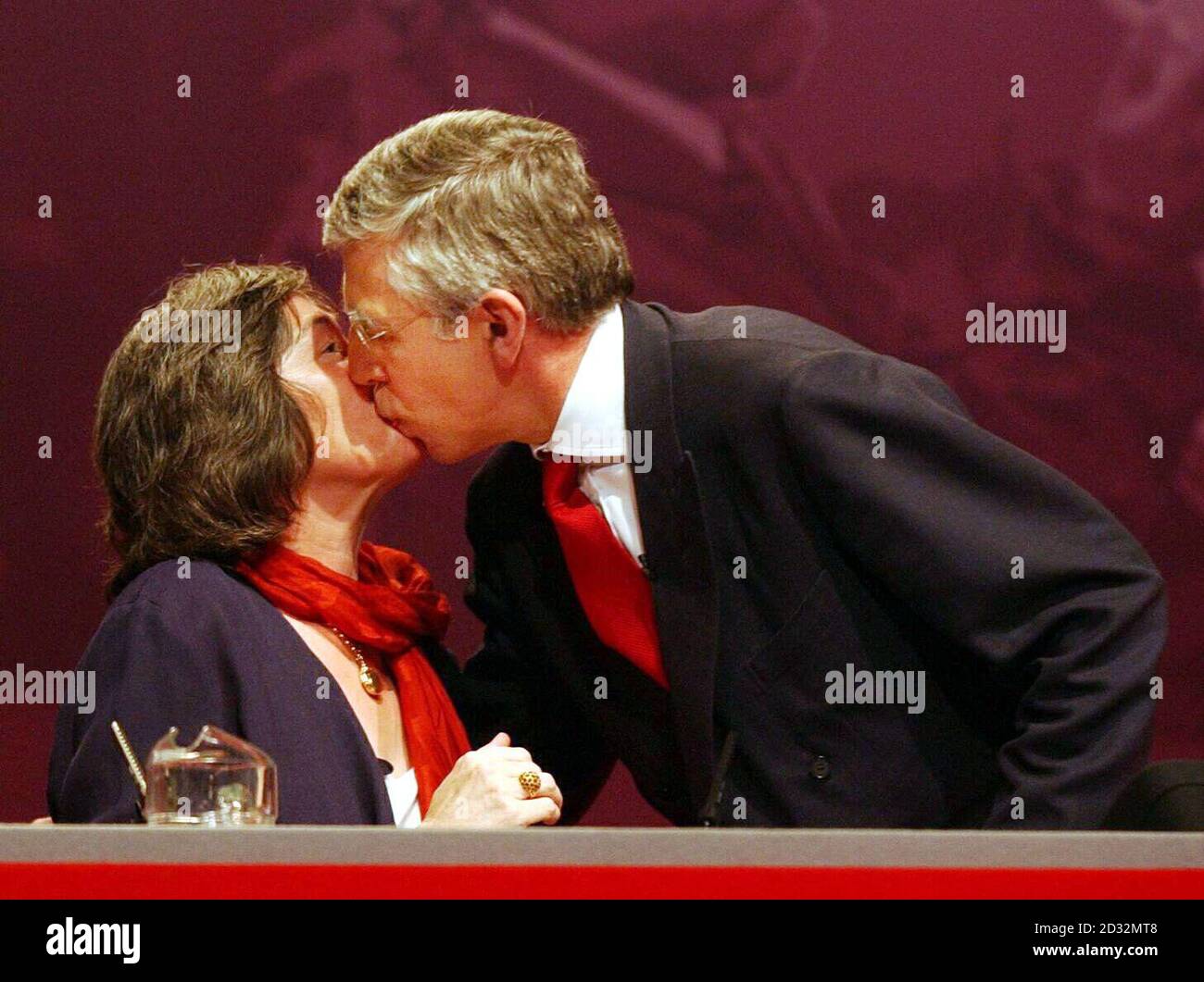 International Development Secretary, Clare Short receives a kiss from Foreign Secretary Jack Straw during the first day of the Labour Party Conference at The Winter Gardens, Blackpool. Stock Photo