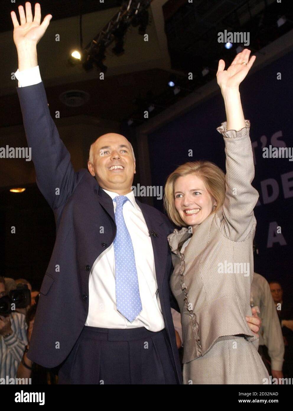 Conservative leader Iain Duncan Smith and wife Betsy acknowledge the applause from delegates after making his keynote speech to the Conservative Party Conference in Bournemouth. Stock Photo