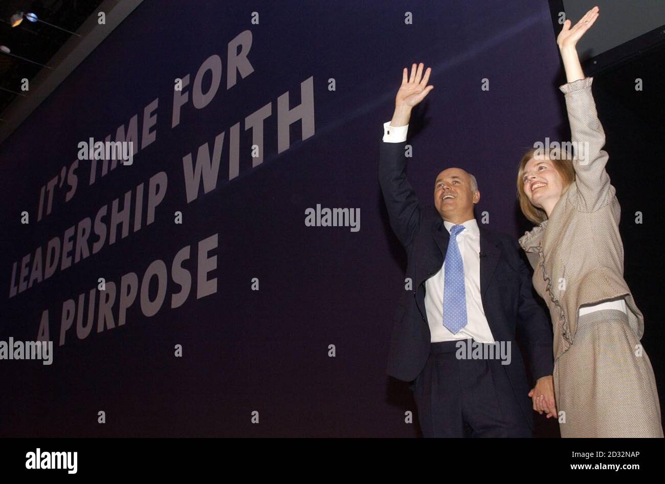 Conservative leader Iain Duncan Smith and wife Betsy acknowledge the applause from delegates after making his keynote speech to the Conservative Party Conference in Bournemouth. Stock Photo