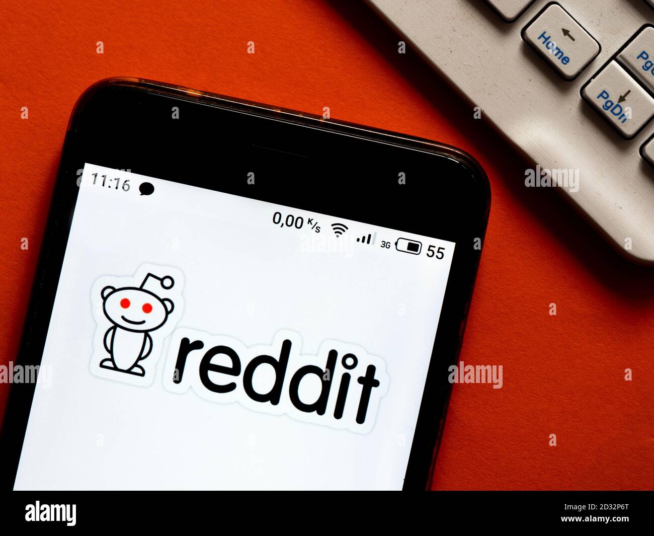 In this photo illustration a Reddit logo is seen displayed on a ...