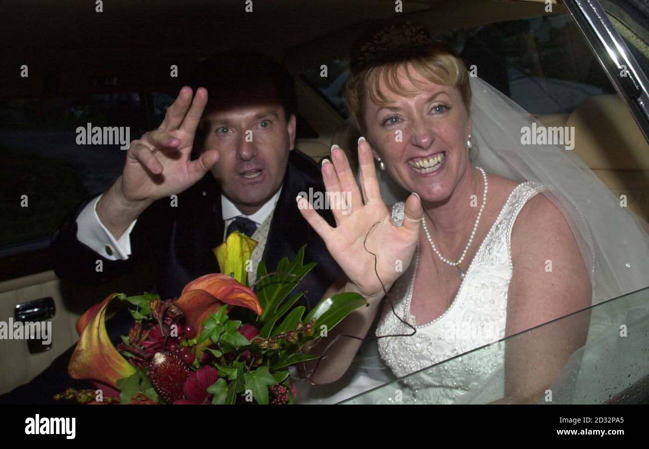 Irish country singer Daniel O'Donnell and his bride, Majella McLennan, leave St Mary's Church by car after they married, in Kincasslagh, Co. Donegal.  Some 550 guests, including friends, family and neighbours, attended the traditional wedding.  * ...  at the church on the water's edge in west Ireland.   Stock Photo