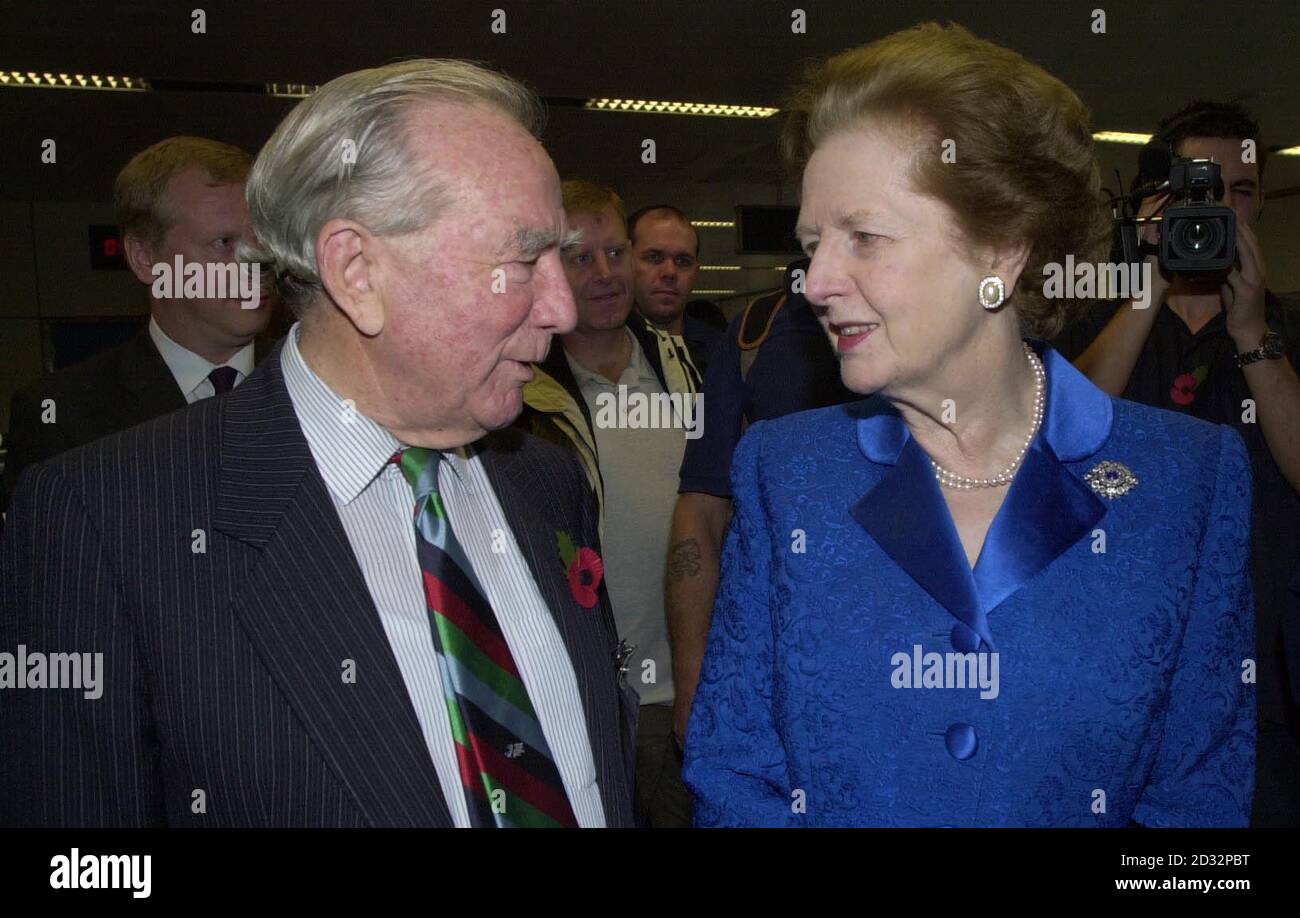 Former Prime Minister Lady Thatcher with Sir Rex Hunt, who was Governor of the Falkland Islands when they were invaded by Argentina,    *  at Gatwick Airport where they met 200 veterans of the campaign who are returning to mark the 20th anniversary of the liberation of the islands.  The Duke of York, who was a helicopter pilot during the war, will also be on the islands for the Remembrance Day service.   Stock Photo