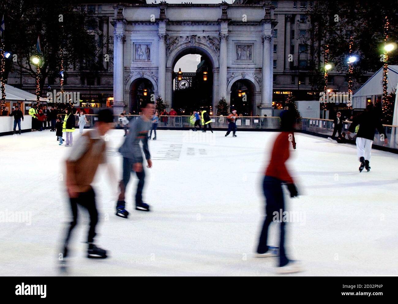 People enjoying themselves on the open air ice rink at Marble Arch, central London,  which will remain open until January 15, 2003.   * The 600 sq metre Ice Rink has been endorsed by Westminster City Council & Oxford Street Association and has been designed with the co-operation of the English Heritage. It is the first time that such an event has been allowed to take place on this historic site. Stock Photo