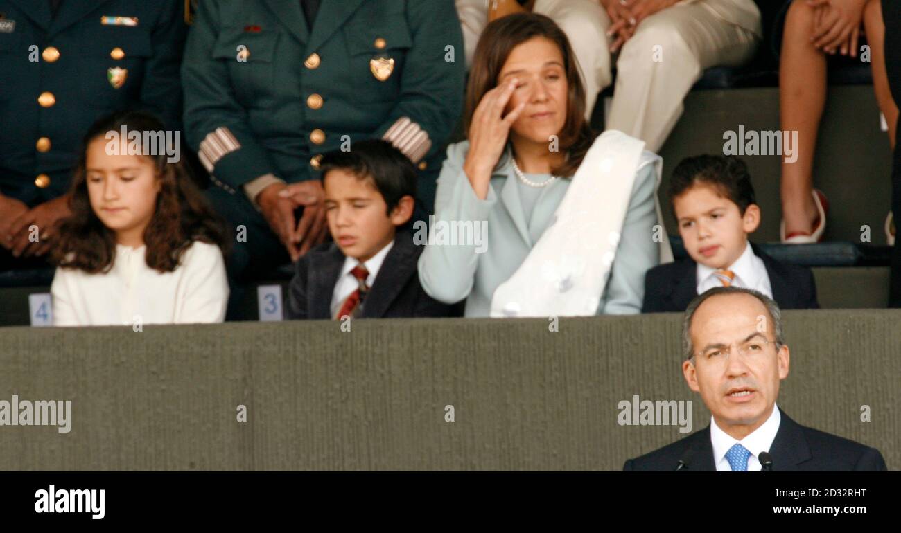 Mexico S New President Felipe Calderon Speaks To The Armed Forces At A Marching Field In Mexico City December 1 2006 As His Family L R Maria Luis Felipe His Wife Margarita Zavala And