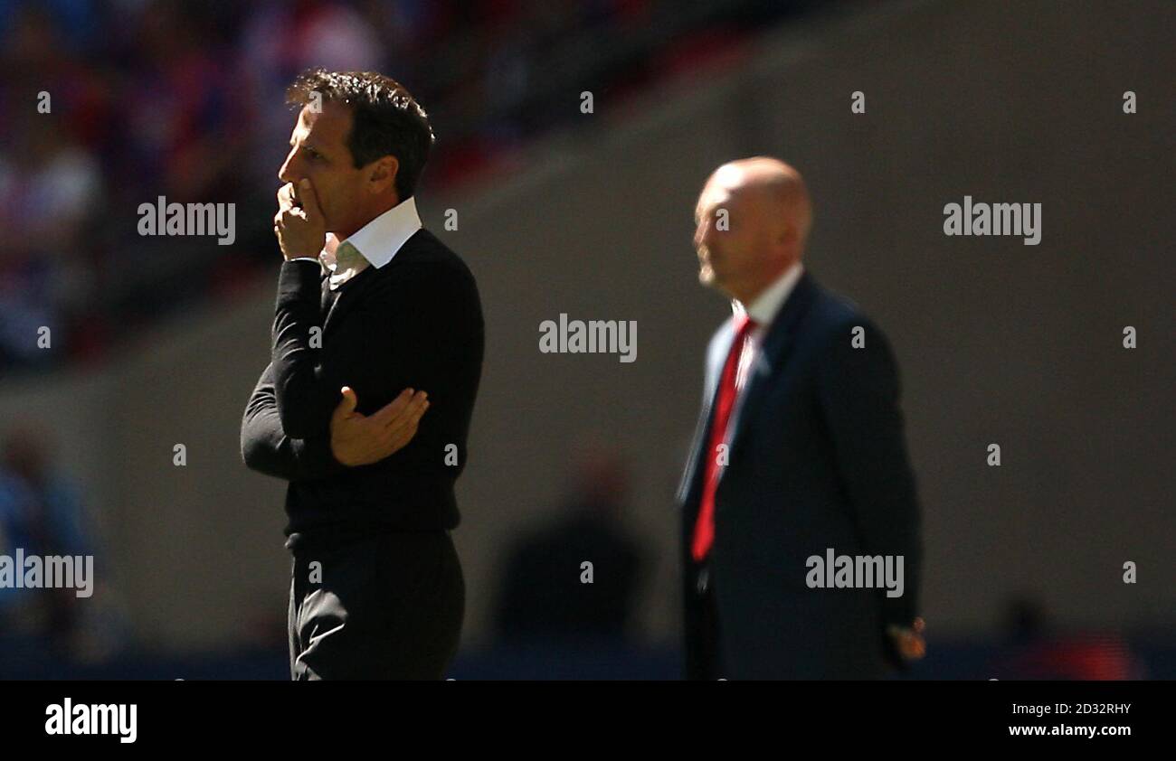 Watford manager Gianfranco Zola (left) and Crystal Palace manager Ian Holloway during the npower Football League Championship Play Off Final at Wembley Stadium, London. Stock Photo