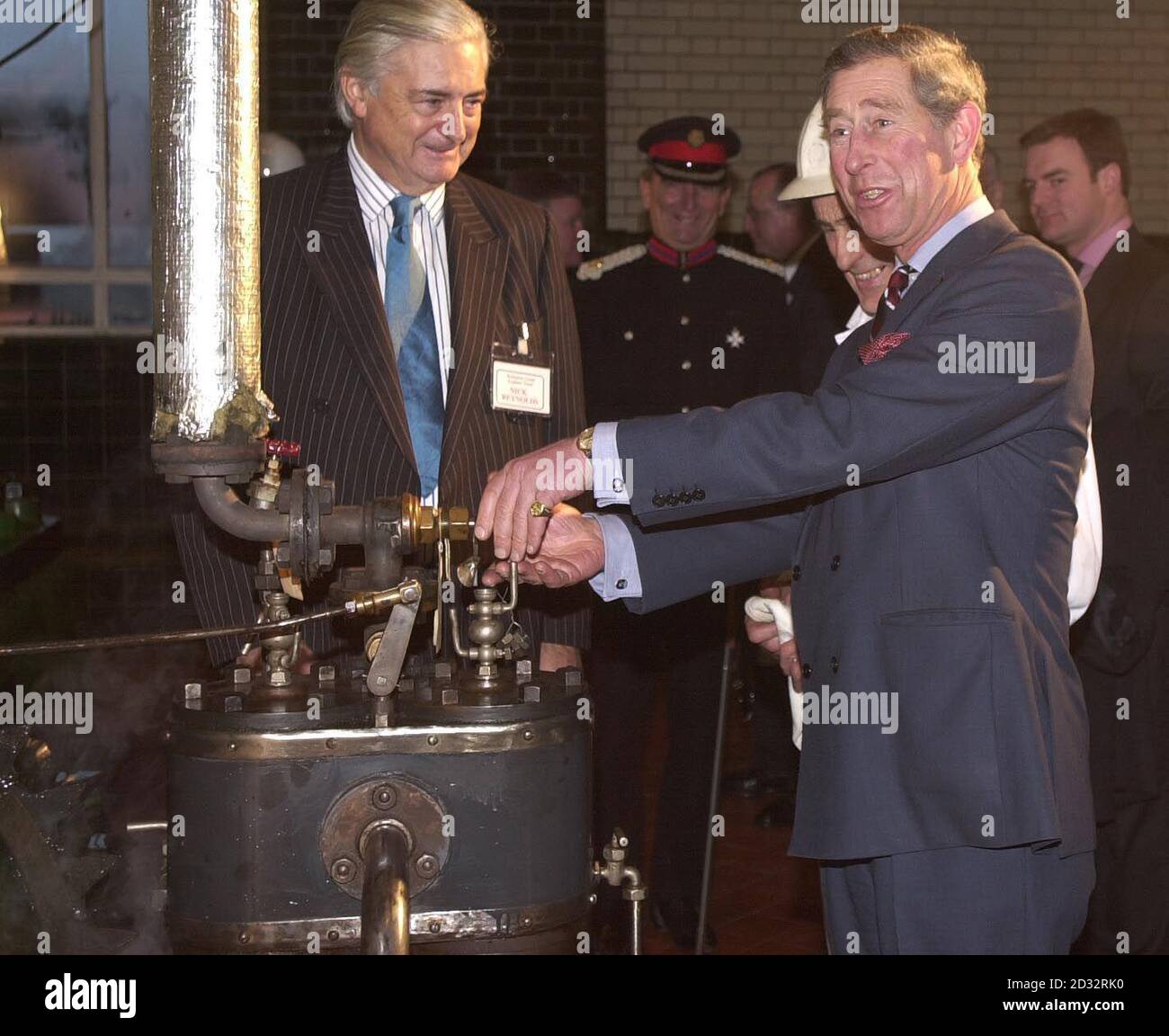 The Prince of Wales turns a valve to start the pumps,  during his visit to the Kempton Park Water Treatment Works in south west London, where he viewed a restored 62ft high engine which has been out of action for the past 20 years at the restored Pump House.   * The engines at Kempton's historic Pump House were the largest of their type in the UK, each operating 1,008 horse power with a crankshaft weighing 30 tons. Now that the restoration of the engine is complete, the  Kempton Great Engines plans to open the Pump House as a museum.  Stock Photo