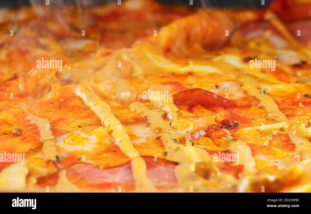 Hot freshly made pizza. Close-up view. Stock Photo