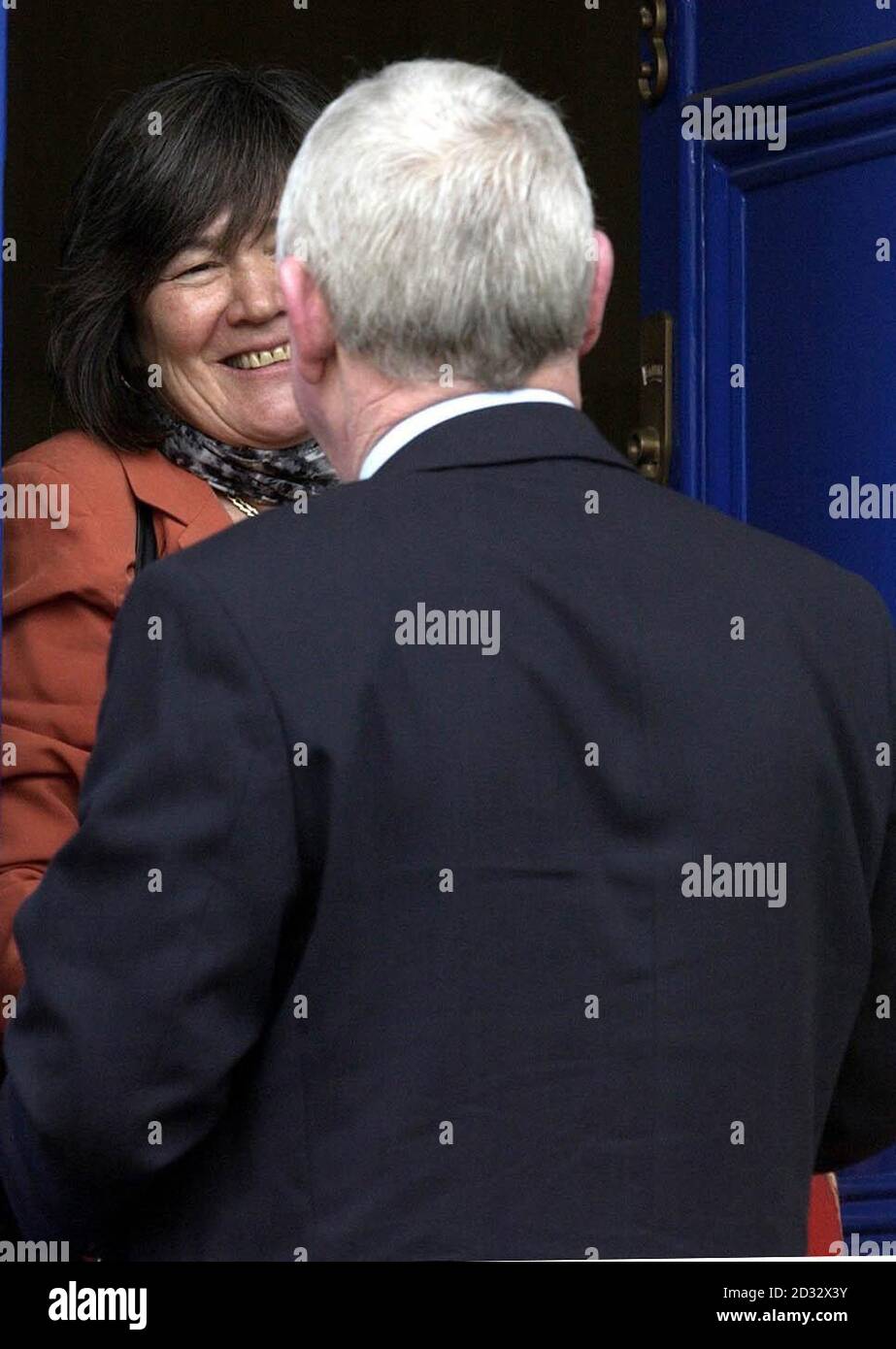 International Development Secretary Clare Short greets her driver as she leaves her London home after she said that she would step down from the Cabinet if the Prime Minister took Britain into a war against Saddam Hussein s regime without UN backing.   * Downing Street said that she had not expressed such views in advance to Mr Blair. Stock Photo