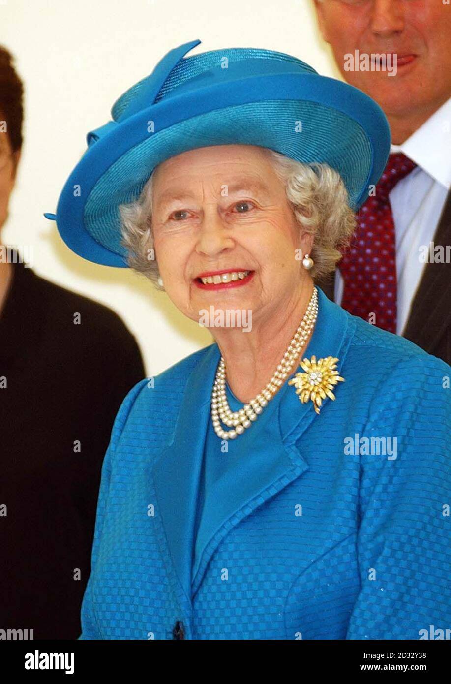 Britain's Queen Elizabeth II, during the opening of the newly built Royal Ballet School in central London's Covent Garden.  * 17/4/03: Queen Elizabeth II, dated 27/03/2003, who was giving Maundy Money to 77 men and 77 women in a setting familiar to Harry Potter fans.  The annual Royal Maundy Service was being held at Gloucester Cathedral where scenes in the JK Rowling films were shot.  Recipients of the Maundy coins are all senior citizens recommended by clergy and ministers of all Christian denominations, in recognition of service to the Church and the community.   Stock Photo
