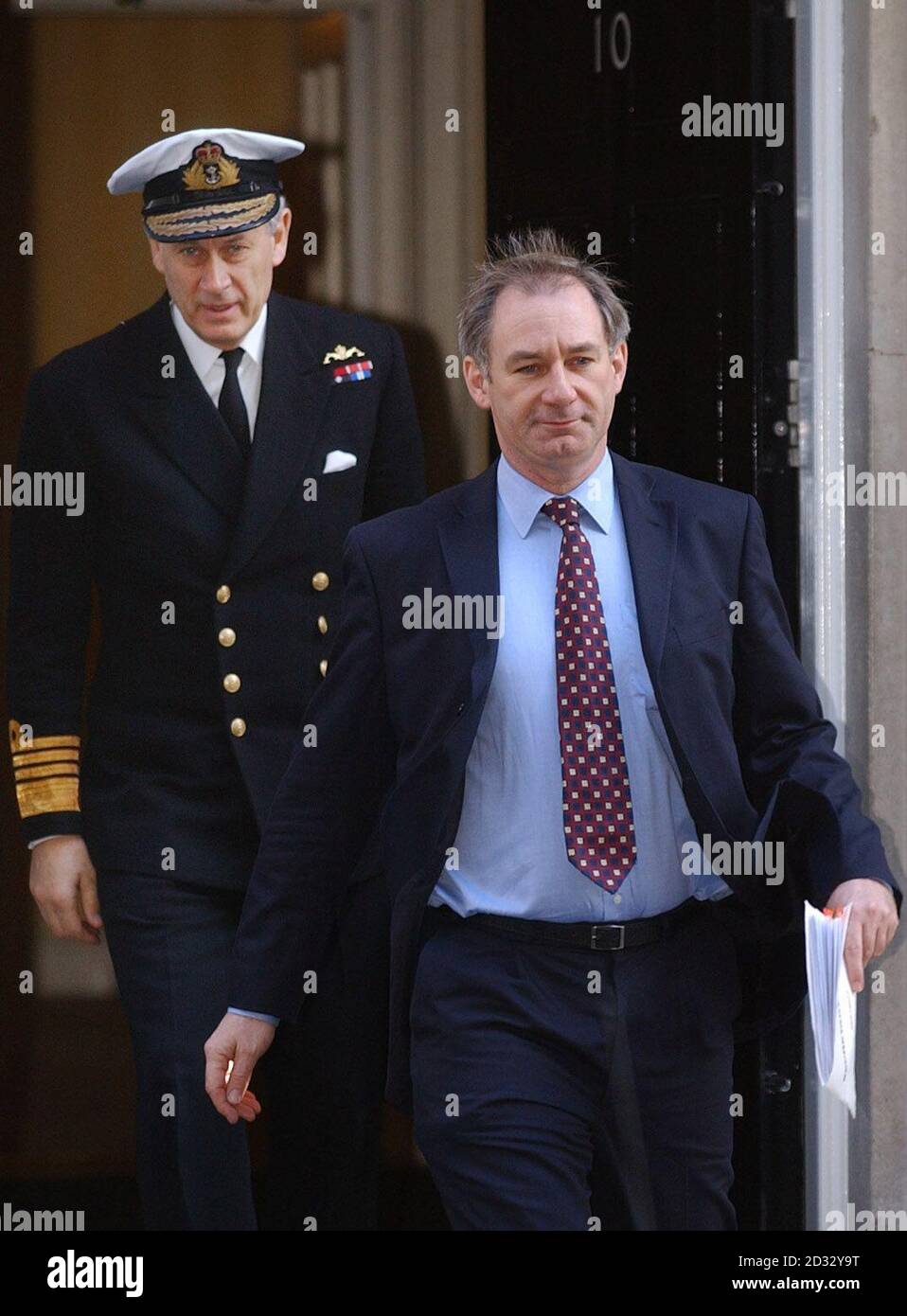 Defence Secretary Geoff Hoon leaves a Cabinet meeting in Downing Street with Chief of the Defence Staff Admiral Sir Michael Boyce.   *... In Iraq it has been reported US troops have entered the centre of Baghdad in force as a spokesman declared: 'We are in and we're staying put'. Stock Photo