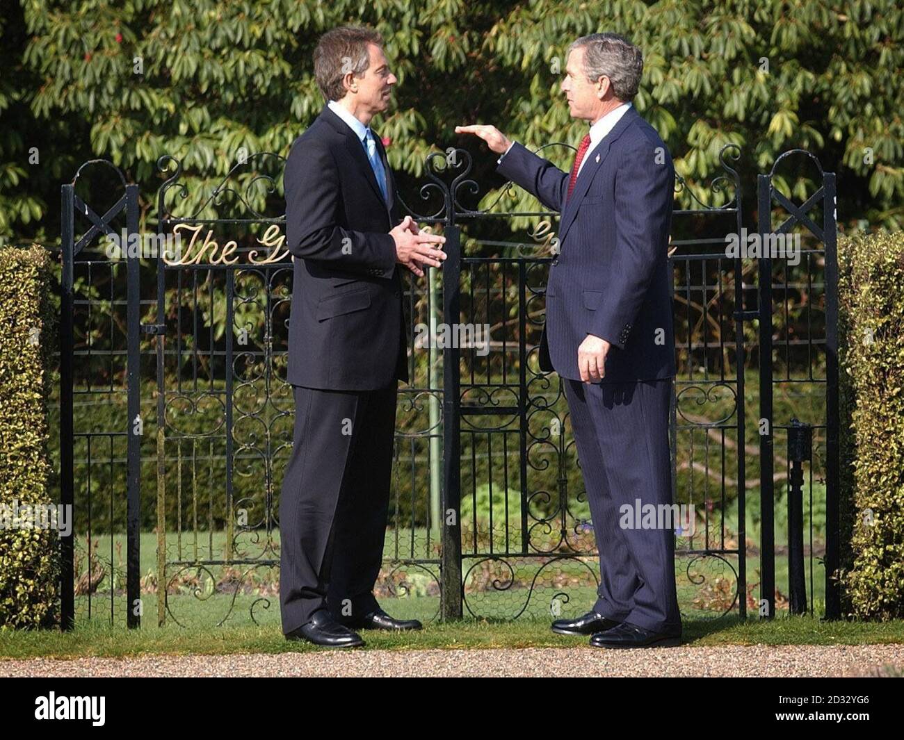 US President George Bush and Prime Minister Tony Blair, at the grounds of Hillsborough Castle in Northern Ireland. During a press conference today, Bush and Blair pledged to hand over power in Iraq to the Iraqi people as 'swiftly as possible'.   * During the meeting they both agreed there would be a 'vital role' for the United Nations in the post-war reconstruction of Iraq and emphasised the need to move as quickly as possible to a new interim Iraqi administration, paving the way to a fully representative government of the country. Stock Photo