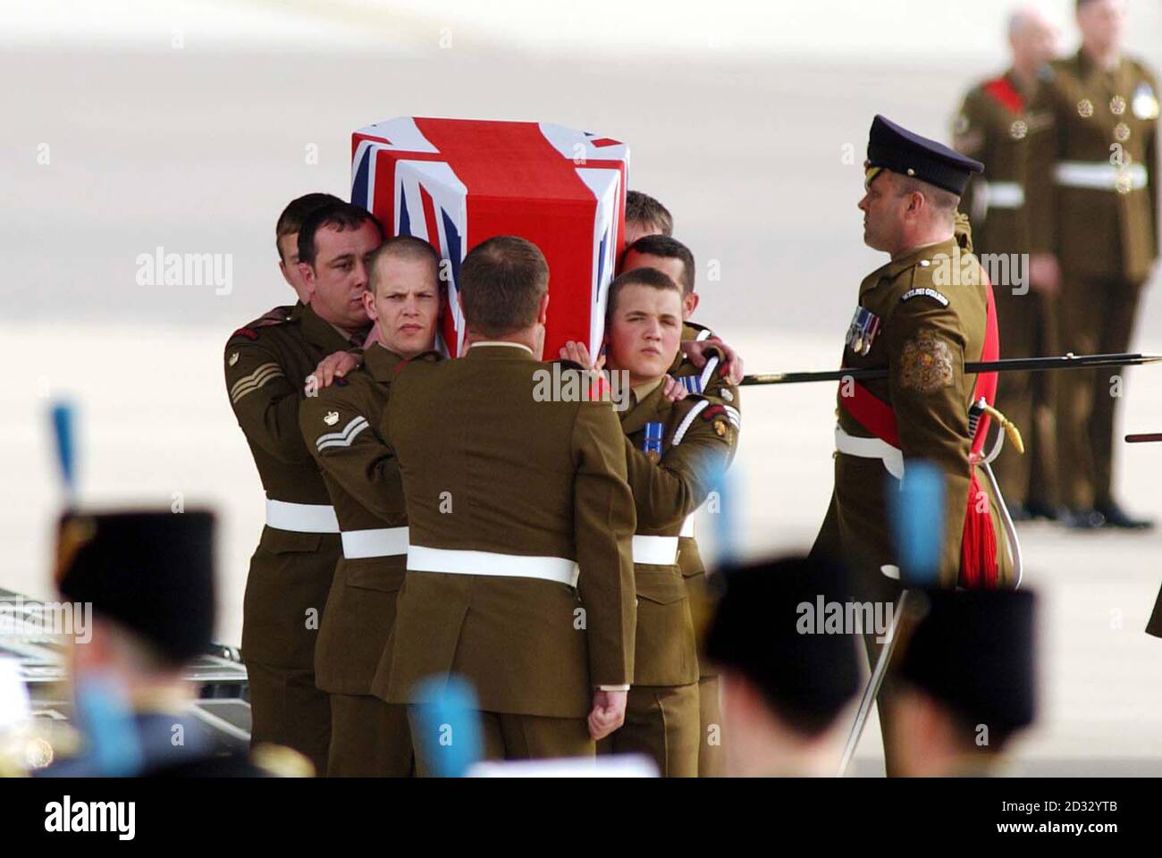 The body of Lance Corporal Karl Shearer arrives at RAF Brize Norton.     * Lance Corporal Shearer, 24, of the Blues and Royals (Household Cavalry) was killed in Iraq when his armoured Scimitar light tank overturned in an accident in which the vehicle commander was also injured. He was married and leaves a three-year-old daughter. He was from Windsor, Berkshire, and joined the Army in 1995. The bodies of seven British servicemen killed in the Iraq conflict were arriving at the Oxfordshire air base for the solemn repatriation ceremony. The return of the seven bodies brings the number of killed s Stock Photo