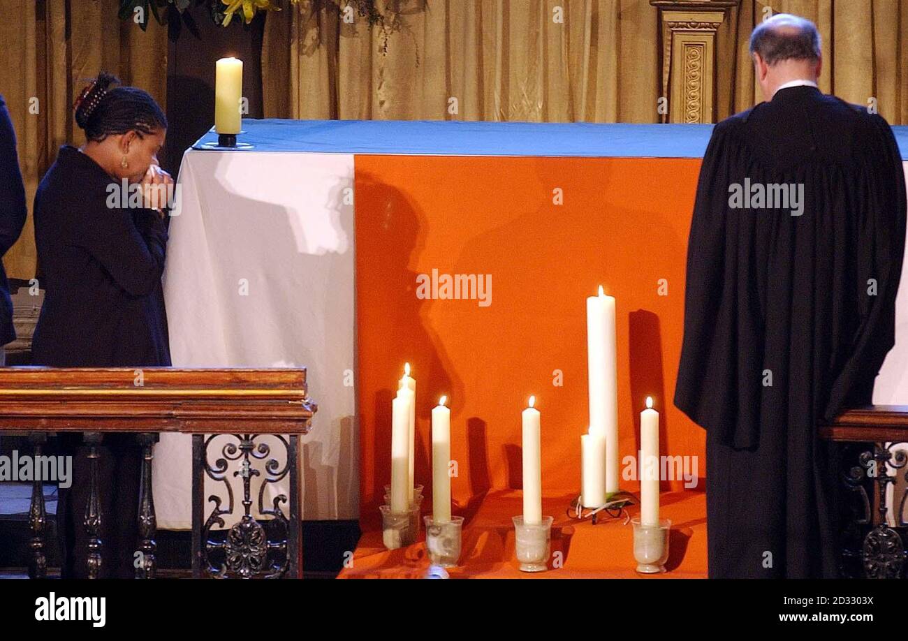 Doreen Lawrence stands in silence, after lighting a candle in memory of her son, during the memorial service on the 10th anniversary of South London teenager Stephen Lawrence's murder, at St Martins-in-the-Fields Church Trafalgar Square, Central London. Stock Photo