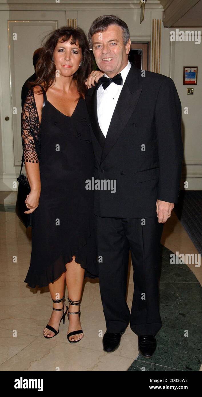 DJ Tony Blackburn with his wife Debbie arrives for the Sony Radio Awards 2003 at Le Meridien, Grosvenor House Hotel in London. Stock Photo