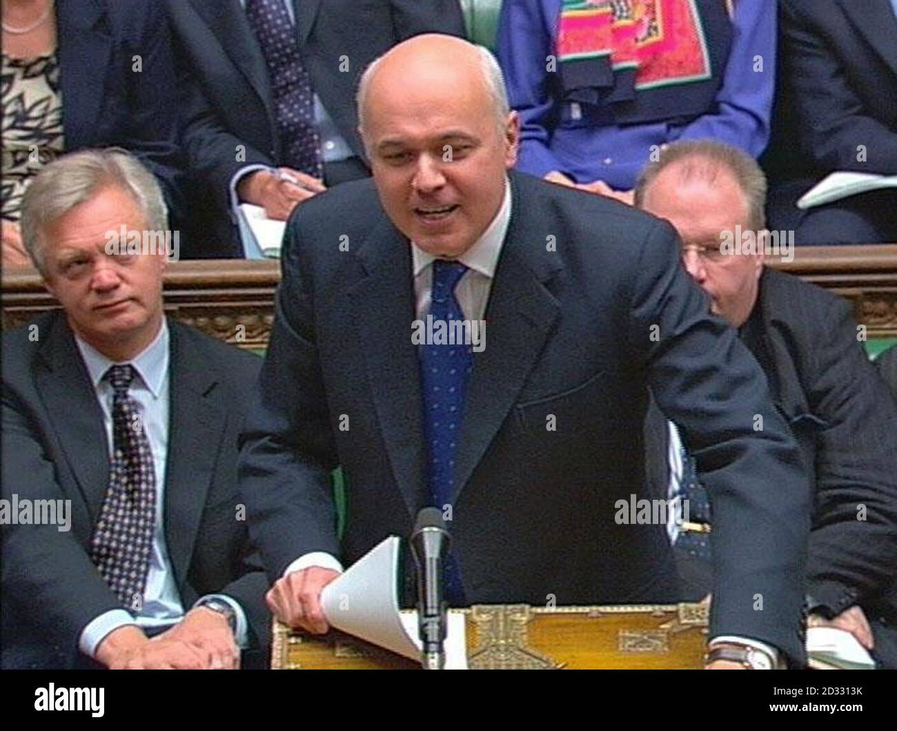 Opposition leader Iain Duncan Smith puts a question to British Prime Minister Tony Blair, during the PM's weekly 'Question Time' in the House of Commons in London. Stock Photo