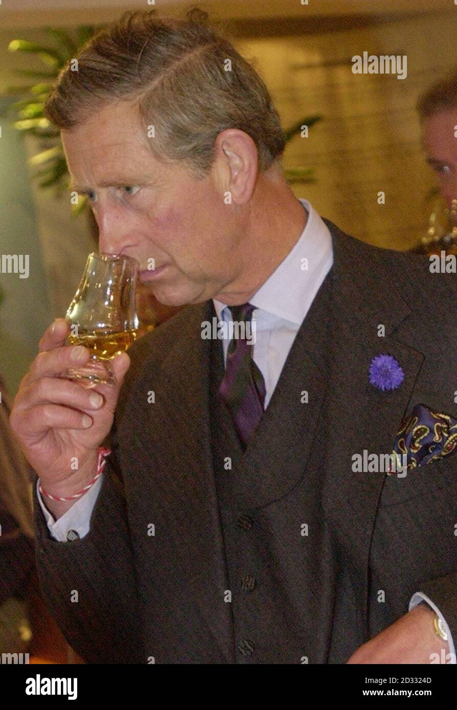 The Prince of Wales samples a  dram of Ardbeg whiskey whilst on a tour of the Scotch Whiskey Heritage Centre on the royal mile to celebrate   British Tourism as  part of Royal Tourism Day. Stock Photo