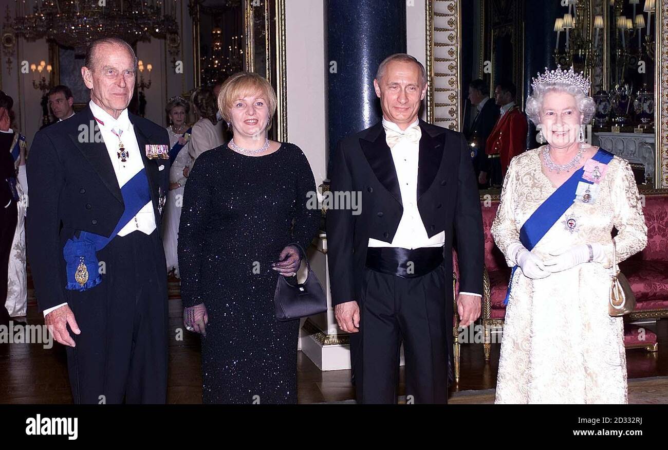 Queen Elizabeth II (right) and her husband, the Duke of Edinburgh (left) stand alongside Russias President Putin and his wife, Lyudmila, before a state banquet at Buckingham Palace. * Earlier, Mr Putin, who is on the first state visit by a Russian leader since 1874 when Tsar Alexander II came to Britain, had been delayed by 15 minutes aftes his motorcade was delayed by heavy traffic as it travelled from London s Heathrow Airport to Horse Guards Parade for the official welcoming ceremony. Stock Photo