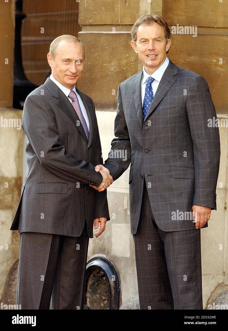 Russia s President Putin (left) shakes hand with British Prime Minister Tony Blair as they arrive at Lancaster House in London for a Russia-UK energy summit. * Later, after talks at Downing Street, President Putin, on the last full day of his state visit to Britain, was vsiting St Paul s Cathedral, the Tower of London and the Royal Observatory at Greenwich, and in the evening was hosting an official banquet at Spencer House attended by the Queen. 13/08/03 The BBC said Russian President Vladimir Putin authorised for the FBI to have an undercover agent sent to Russia. The arms dealer fle Stock Photo