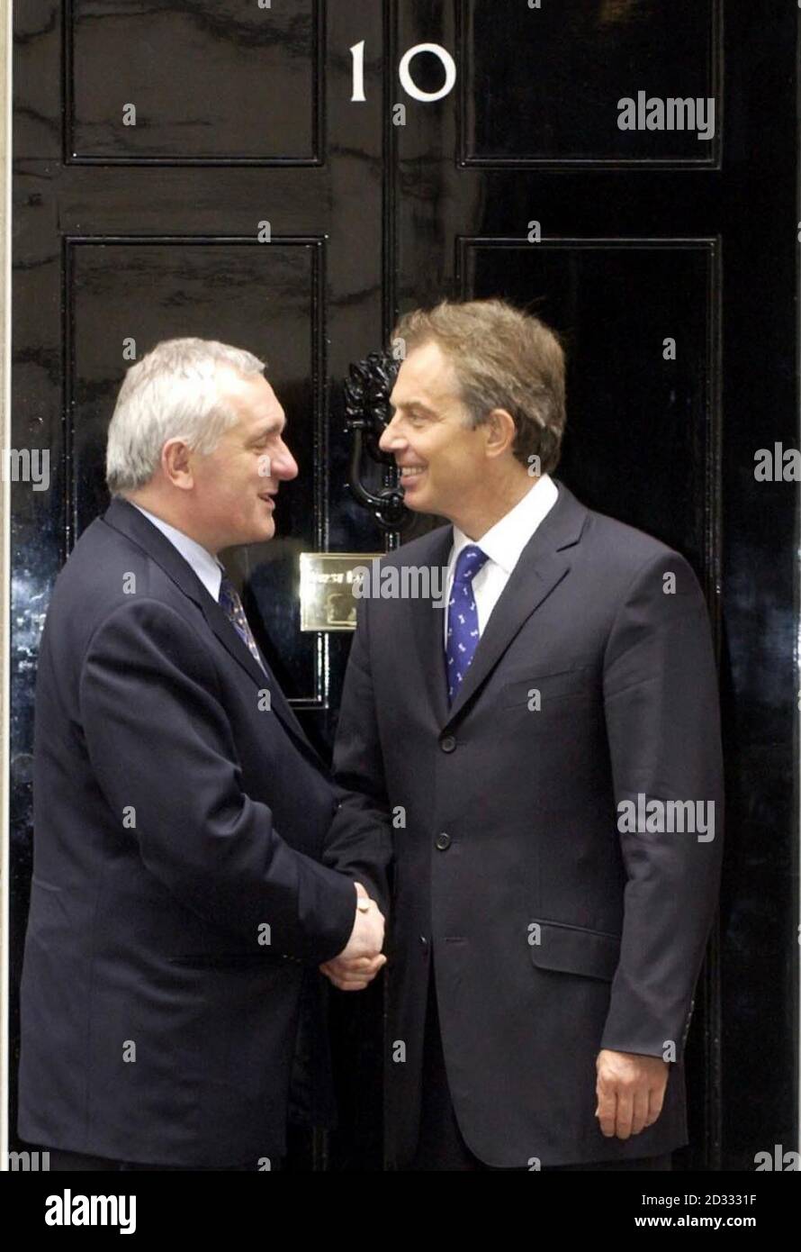 Irish Prime Minister Bertie Ahern is greeted by Prime Minister Tony Blair outside 10 Downing Street. The two premiers were having talks on a range of issues including human rights and criminal justice reforms,   * .. in a bid to inject fresh momentum into the troubled Northern Ireland peace process. Stock Photo