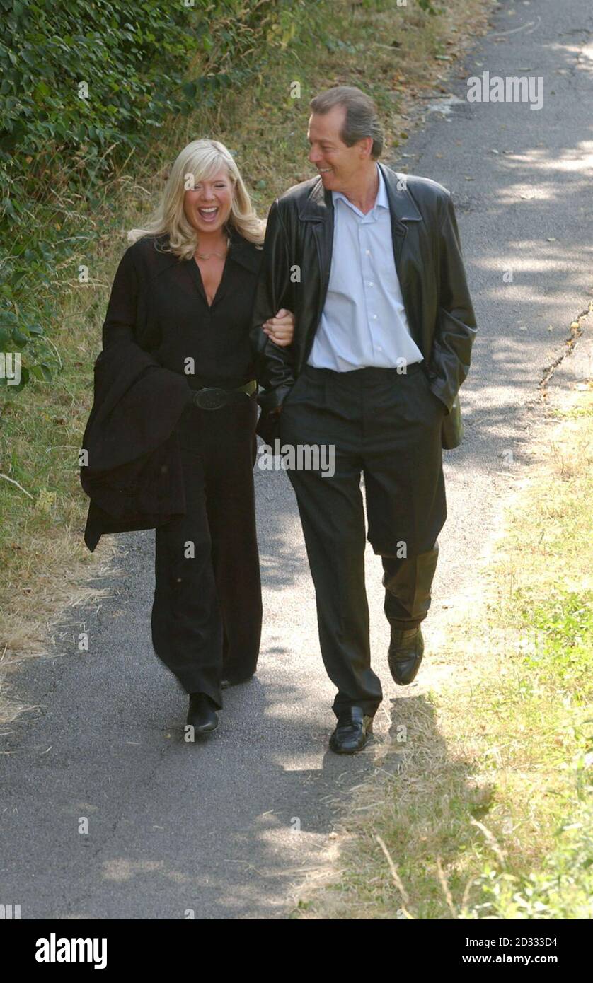 Actor Leslie Grantham with actress Letitia Dean during a photocall to introduce the return of his character 'Dirty Den', to the BBC soap Eastenders, in Alperton, London. Grantham left the programme in 1989. Stock Photo