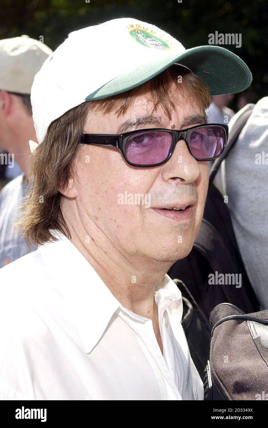 Former Rolling Stones guitarist Bill Wyman arrives to join Eric Clapton's celebrity team against Alec Stewart's Bunbury side in celebration of the England player's testimonial year at Ripley Court School in Surrey.  * Proceeds from the event will be divided between the Testimonial, NSPCC's Full Stop Campaign and the Cross Roads Clinic, Antigua.  Stock Photo