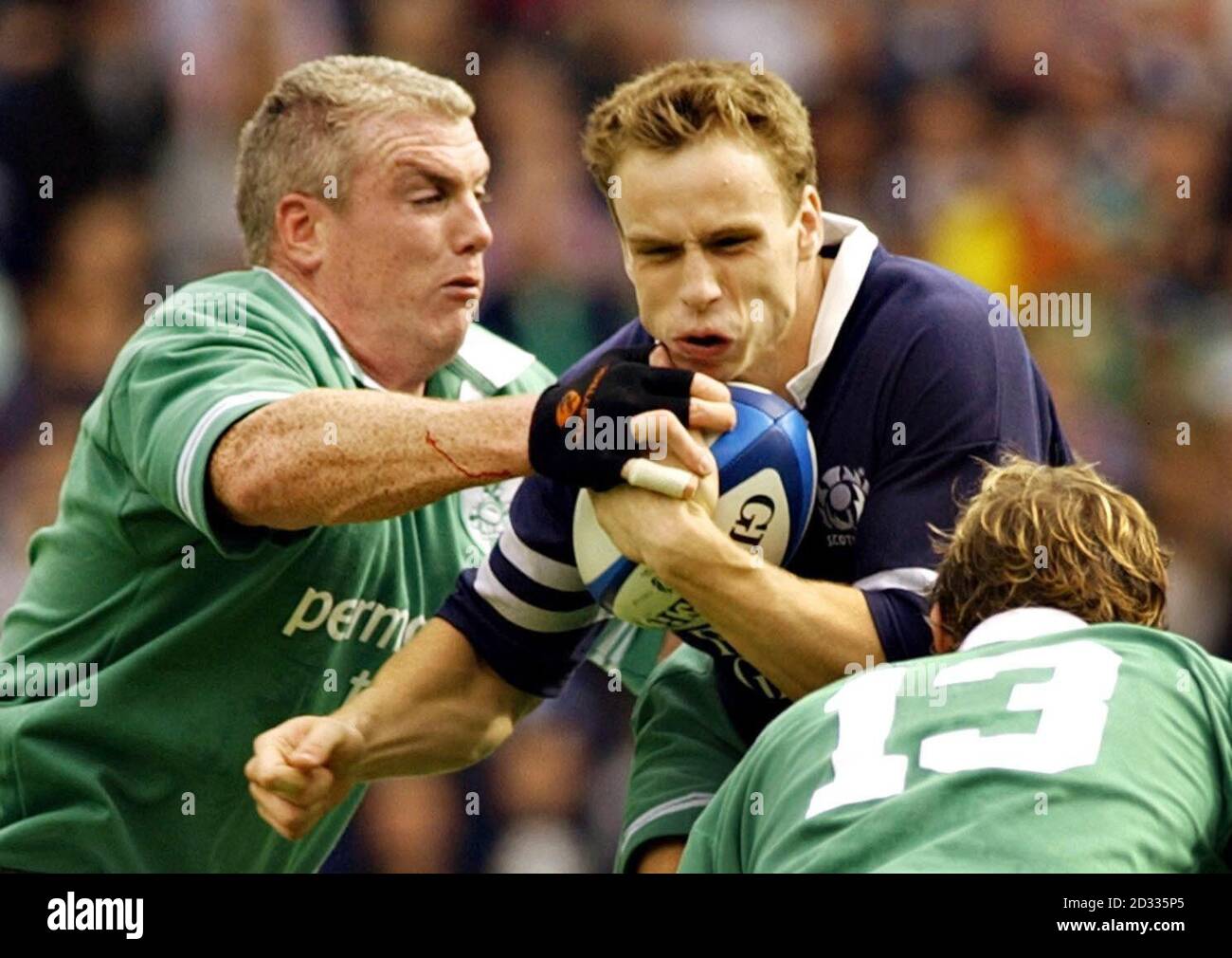 Scotland S Andrew Henderson Holds Off The Challenge From Ireland S Victor Costello Left During The International Friendly Game At Murrayfield Edinburgh Stock Photo Alamy
