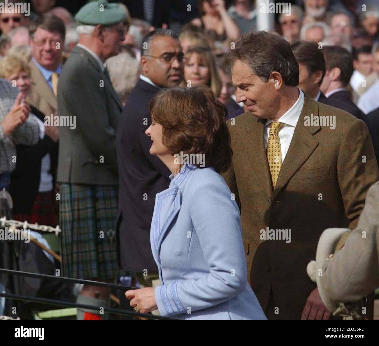 Prime Minister Tony Blair and wife  Cherie arrive at the Braemar Royal Highland Games, in Aberdeenshire.   *  The pair joined Queen Elizabeth and the Duke of Edinburgh to watch the annual event which has a history stretching back to the days of King Malcolm Canmore, 900 years ago. Stock Photo