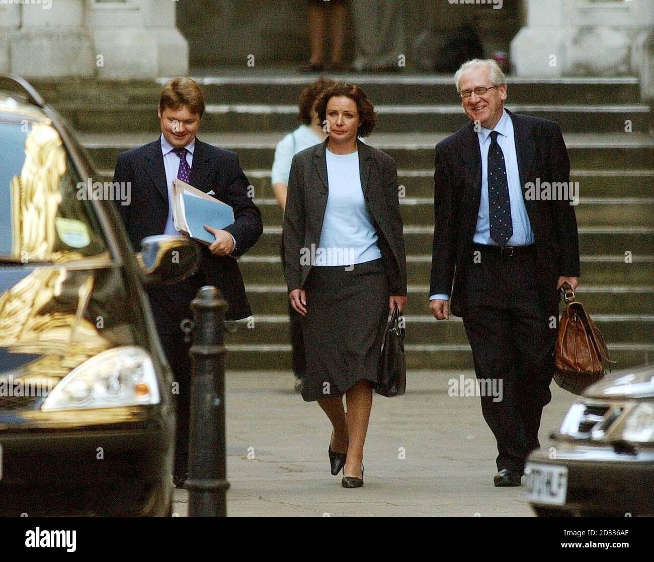 Chief press officer for the Ministry of Defence, Kate Wilson departs from the High Court in central London, after giving evidence to The Hutton Inquiry, into the death of weapons inspector Dr David Kelly. During the inquest Ms Wilson, told Mr Dingemans that she had been in the position since July 2002 but had worked in the MoD press office between 1996 and 2000. She said she spoke to BBC Journalist Mr Andrew Gilligan, on May 28 around 7.30pm and said she had known him all the years she had been a press officer. 31/10/2003: Ministry of Defence chief press officer Kate Wilson becomes an OBE. Stock Photo