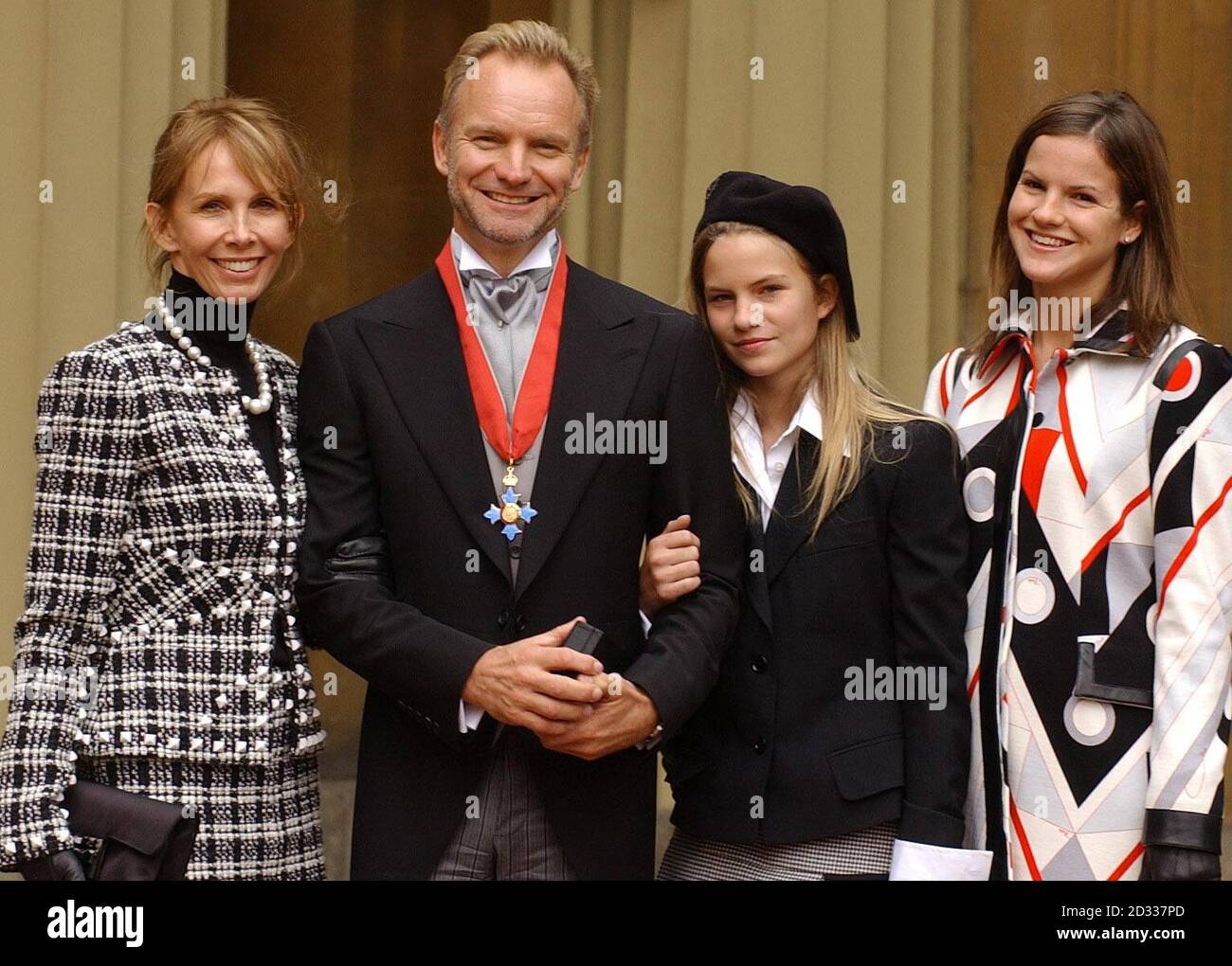 Gordon Sumner 'Sting' with his wife Trudie Styler, and daughters Coco, 13, and Kate, 21,  holding his CBE at Buckingham Palace, which he received for services to the music industry. 'I'm surprised and flattered to receive this honour,' he said recently. 'If my mum and dad were still here they would be made up.' A father of six and a devoted Yoga practitioner, the 51-year-old star was born in Wallsend, on Tyneside, the son of a milkman. Stock Photo