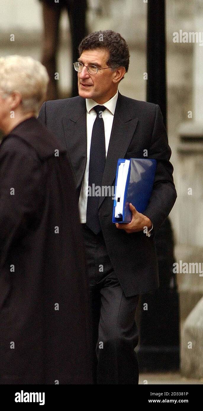 The Permanent Secretary at the Ministry of Defence, Sir Kevin Tebbit leaves the High Court, London, following his appearance at the Hutton Inquiry into the death of Government scientist Dr David Kelly. Lord Hutton today reconvened proceedings in Court 73 after Sir Kevin's scheduled appearance last month was cancelled. Stock Photo