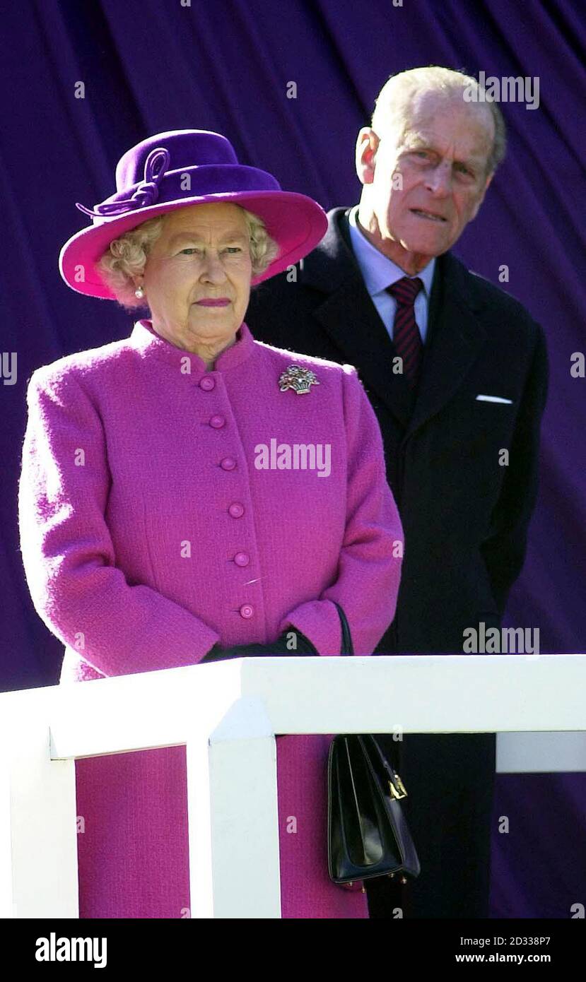 The Queen Elizabeth II accompanied by The Duke of Edinburgh before the unveiling of a bronze equestrian statue depicting Her Majesty on Horseback at the highest point on Queen Anne's ride, Windsor Great Park. The statue was made by sculptor Philip Jackson, and commissioned by the Crown Estate in honour of Her Majesty's Golden Jubilee. Stock Photo