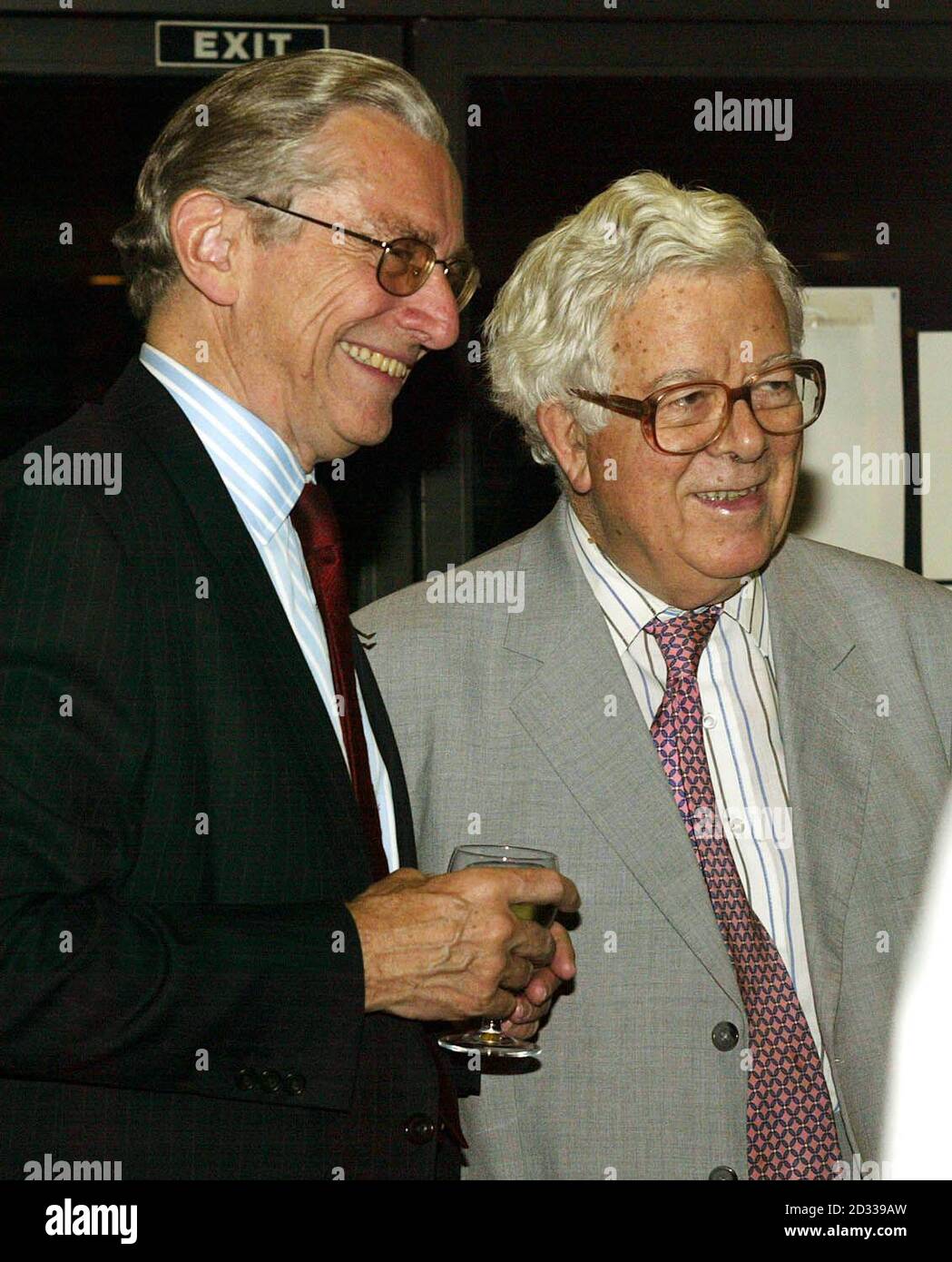 Lord Norman Fowler with Lord Geoffrey Howe at the book launch of Oliver Poole's 'Black Knights' in central London. Stock Photo