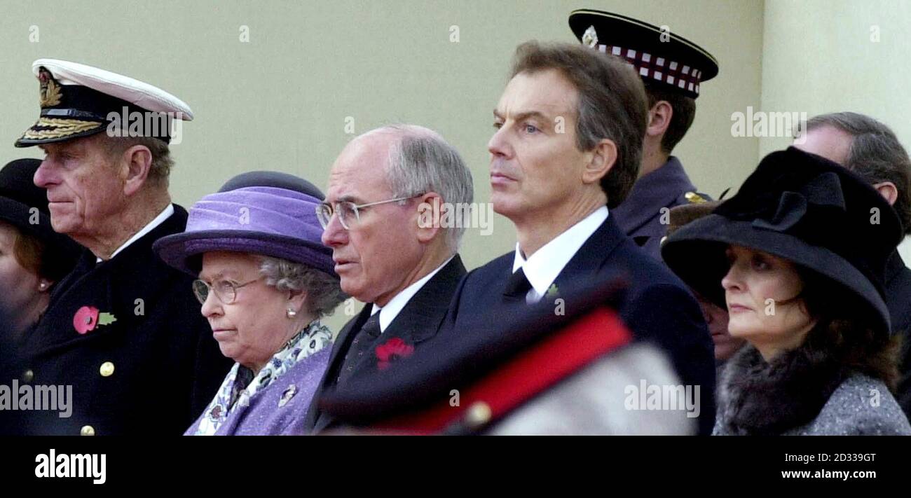 (From left-right) The Duke of Edinburgh, Queen Elizabeth II,  Australian Prime Minister John Howard, British Prime Minister Tony Blair and Cherie Blair during a service of remembrance at Hyde Park Corner, London, where two-minutes silence was observed at 11am today, in honour of the UK's war dead.  The Australian War Memorial was unveiled at the service. Stock Photo