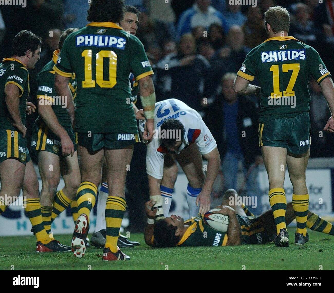 Adrian Morley (no 12) of the Great Britain Rugby League Team checks the condition of one of the Australian players following another controversial tackle in the Second Rugby League Test Match at the KC Stadium, Hull Stock Photo